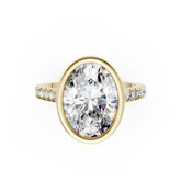 Oval Brilliant Diamond Bezel Engagement Ring with Hidden Halo Diamond