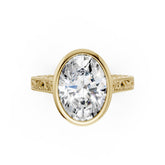 Oval Cut Bezel Set Filigree Engagement Ring