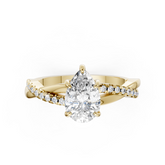 Pear Cut Diamond Twisted Infinity Ring With Half-Pavé Shank