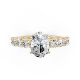 Oval Cut Diamond With Scalloped Graduated Shank Ring