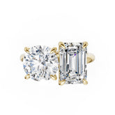 Emerald And Round Cut Diamond Two-Stone Ring
