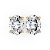 Oval Cut Diamond Stud Earrings in Scalloped Basket Setting