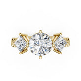 Round Cut and Princess Cut Diamond Three-Stone Ring