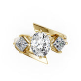 Oval and Princess Cut Diamond Three-Stone Bypass Ring