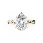Pear Cut Diamond Twisted Anniversary Ring With Pave Band
