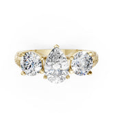 Pear Cut Three-Stone With Ribbed Textured Band Ring