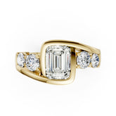 Unique Five-Stone Emerald And Round Diamond Ring