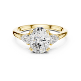 Oval Cut Three Stone Wedding Ring With Trillion Side Diamonds