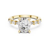 Oval Cut Diamond Anniversary Ring With Pear Side Stone