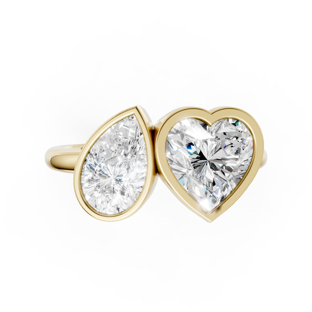 Toi at Moi Bezel Set Pear And Heart Cut Diamond Anniversary Ring