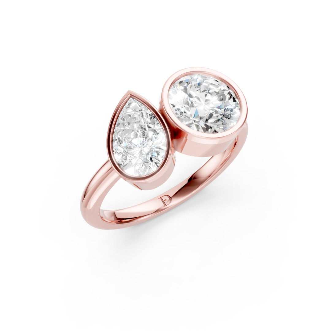Toi at Moi Bezel Set Pear and Round Cut Diamond Anniversary Ring