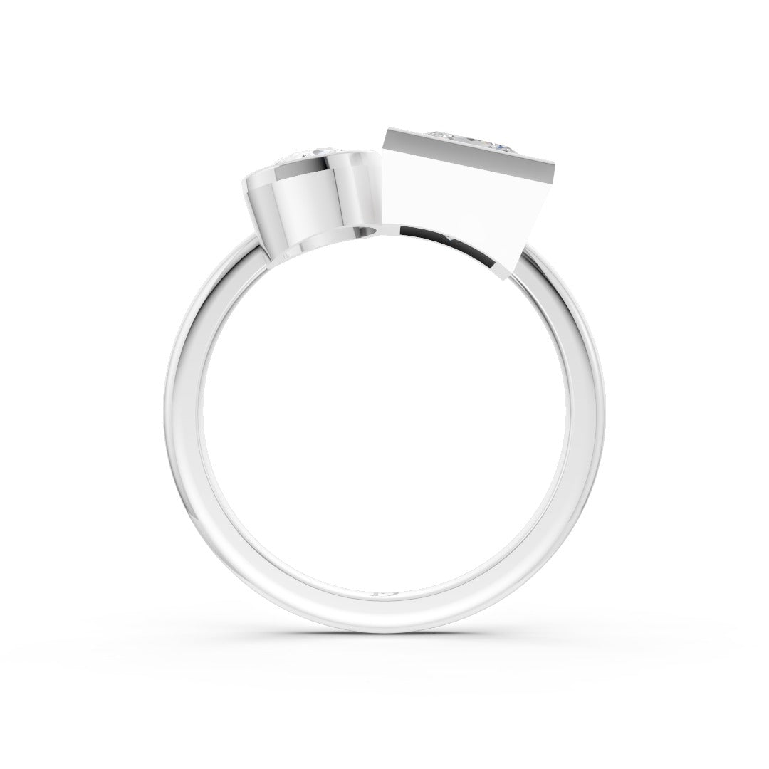 Toi at Moi Bezel Set Pear and Princess Cut Diamond Anniversary Ring