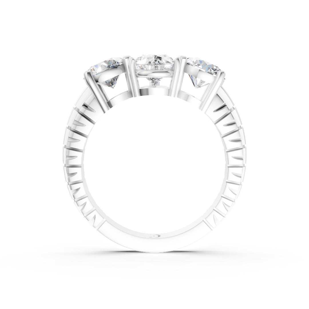 Pear Cut Three-Stone With Ribbed Textured Band Ring