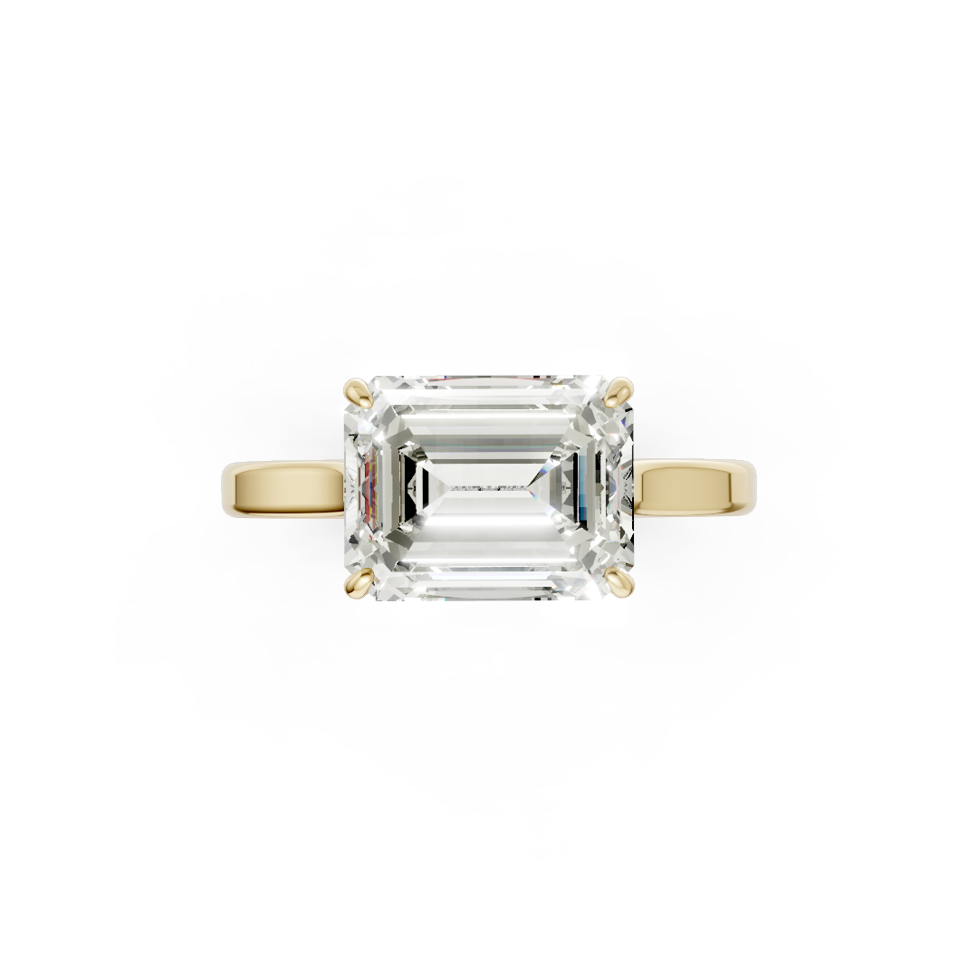 East West Emerald Solitaire Ring