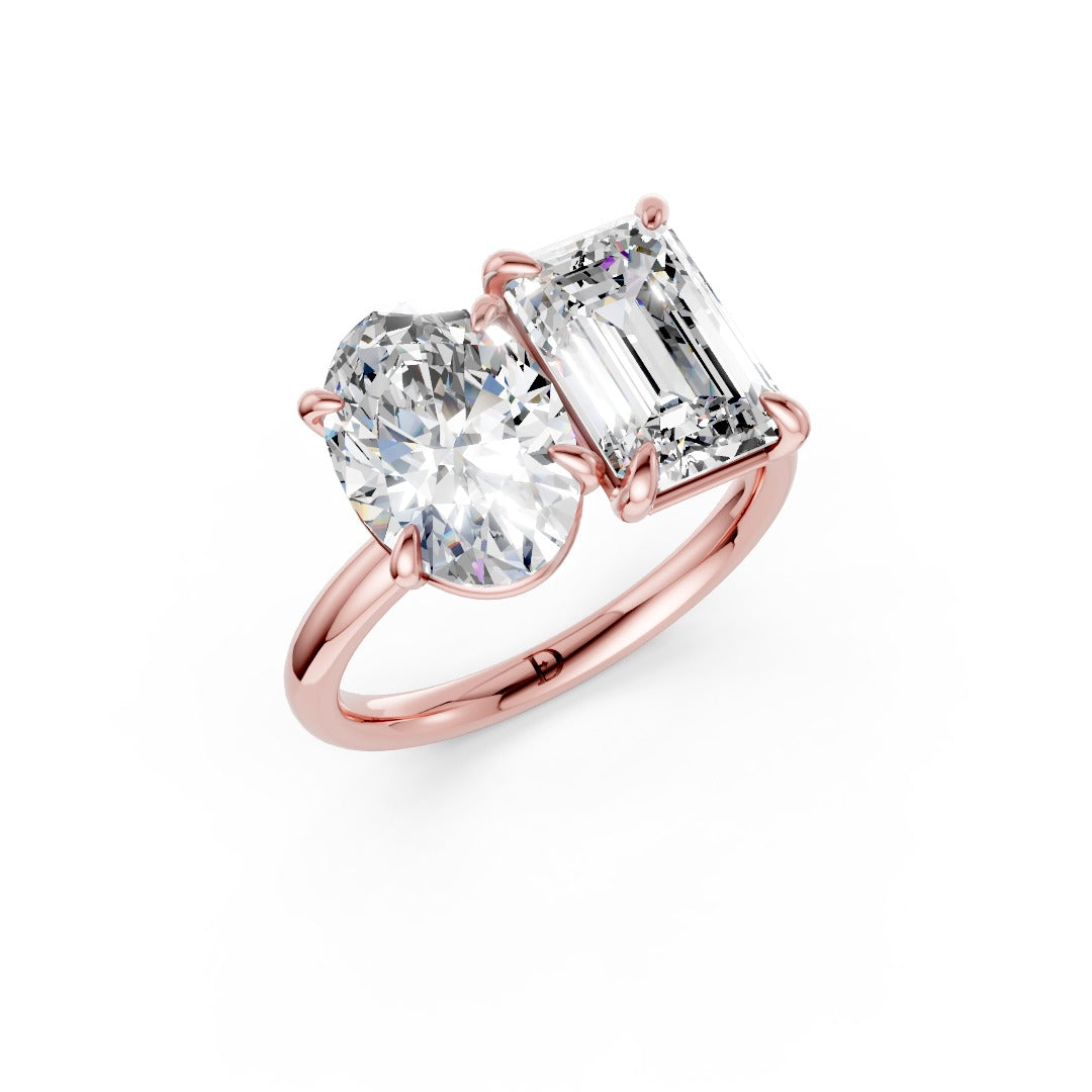 Emerald And Oval Cut Diamond Two-Stone Ring