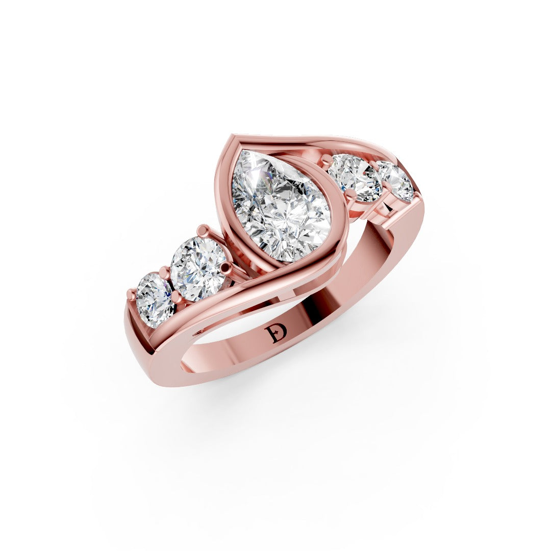 Unique Five-Stone Pear And Round Diamond Ring