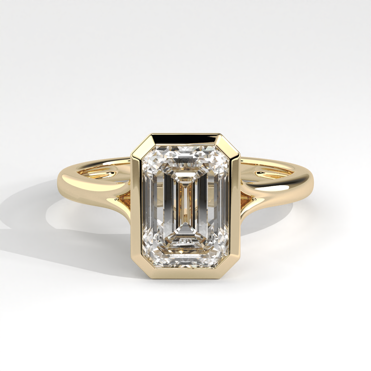Bezel Set Emerald Diamond Split Shank Ring