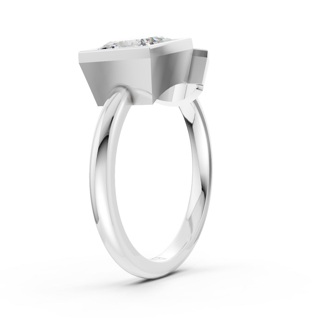 Toi at Moi Bezel Set Pear and Princess Cut Diamond Anniversary Ring