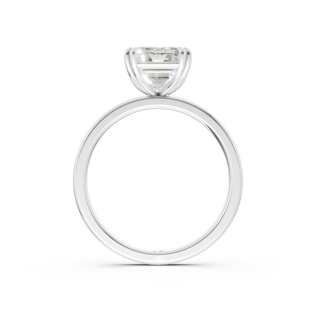 Double Prong Emerald Solitaire Ring