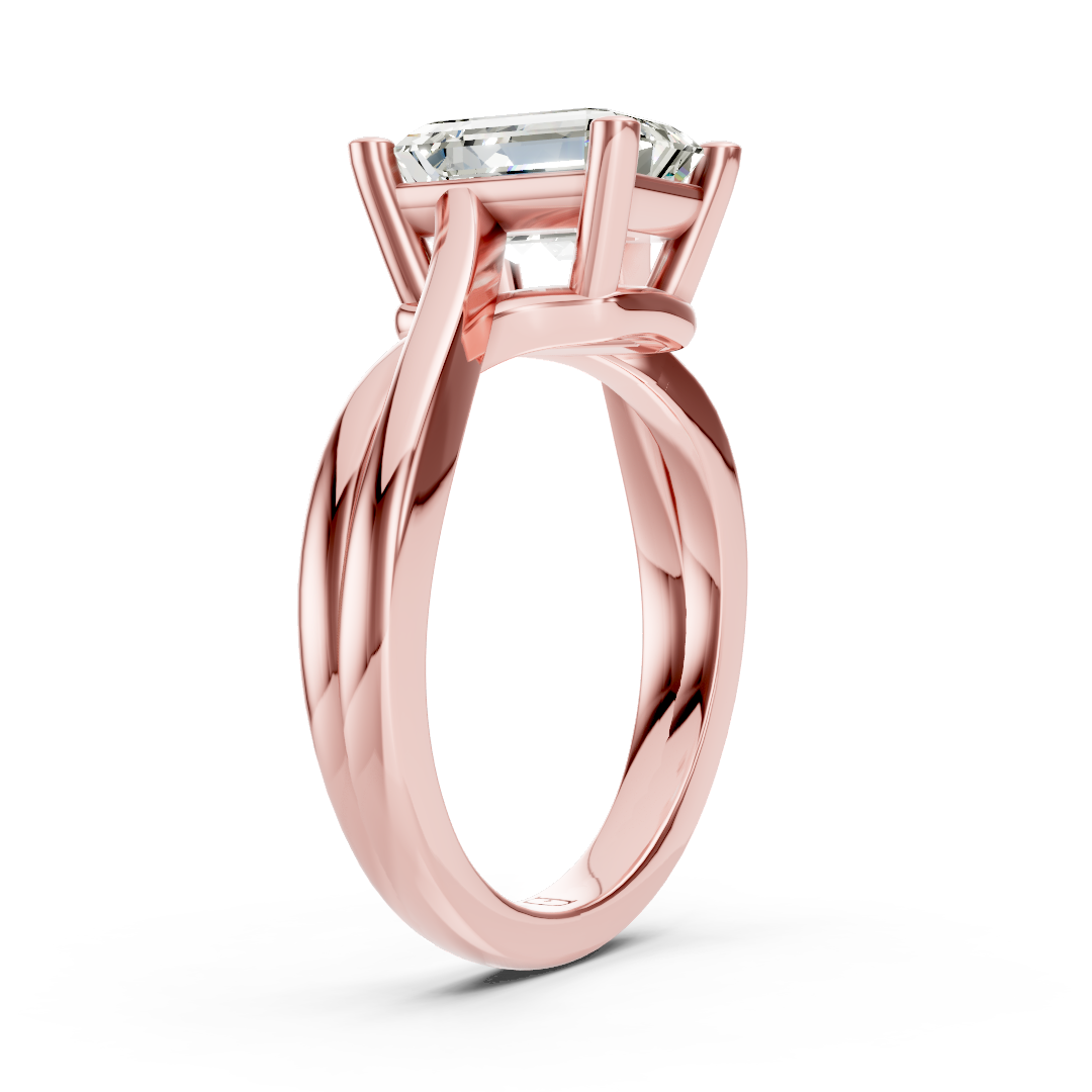 Twisted Shank Emerald Diamond Solitaire Ring