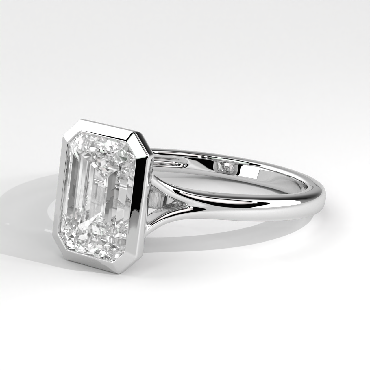 Bezel Set Emerald Diamond Split Shank Ring