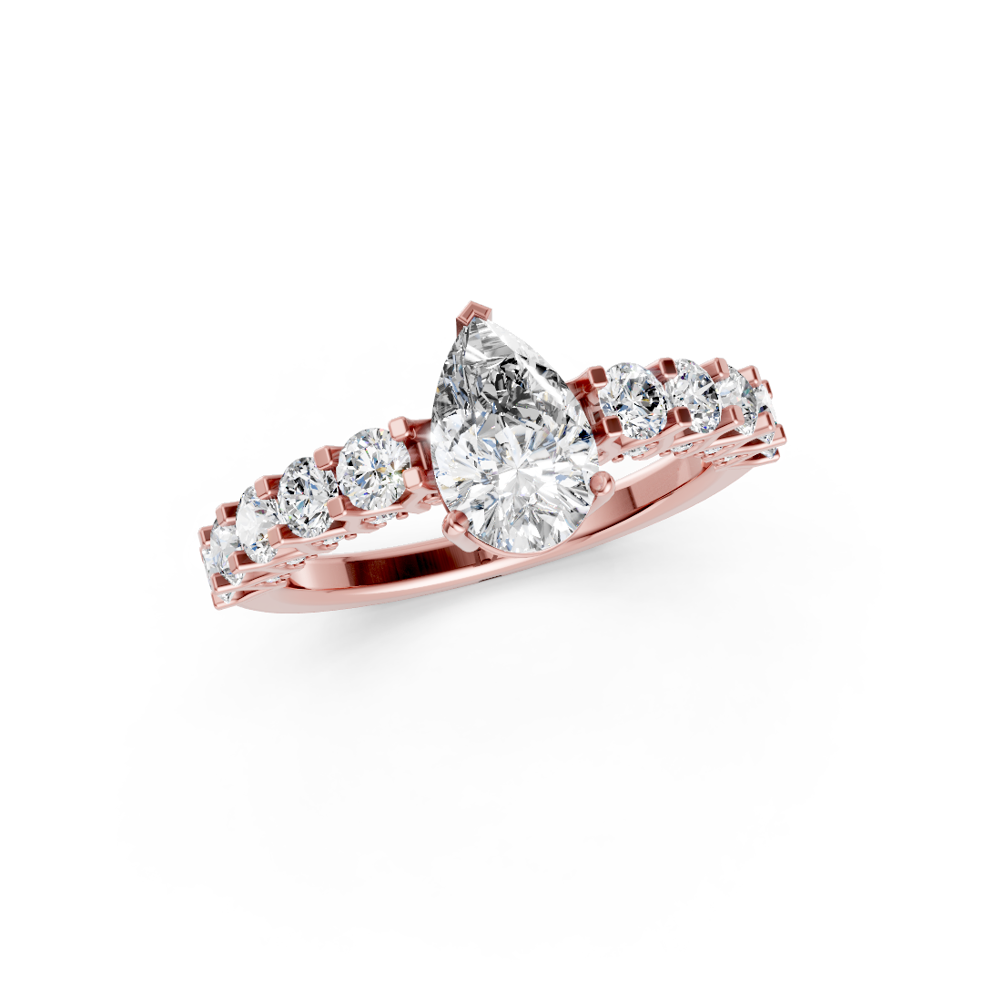 Pear Cut Diamond With Scalloped Graduated Shank Ring