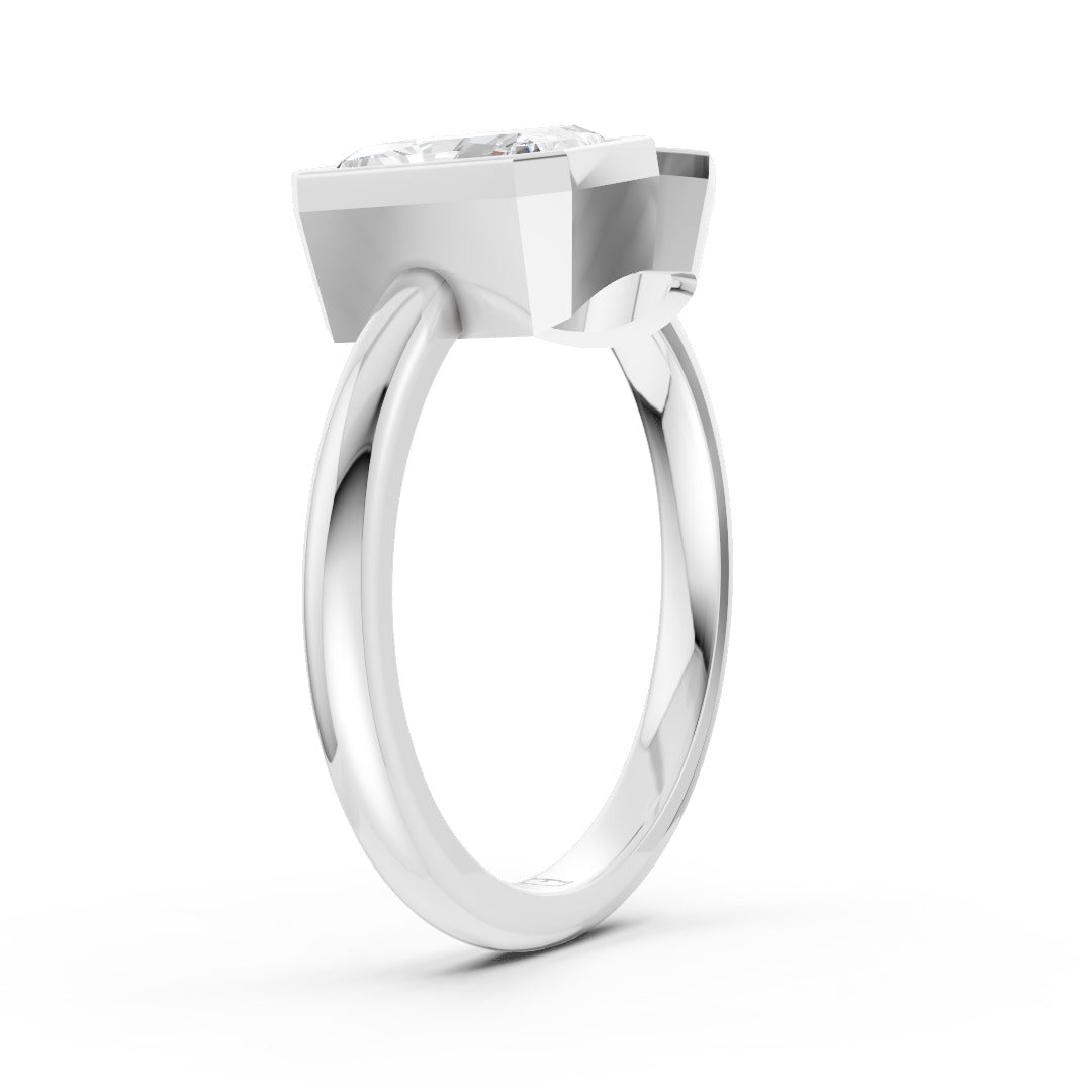 Toi at Moi Bezel Set Pear and Radiant Cut Diamond Anniversary Ring