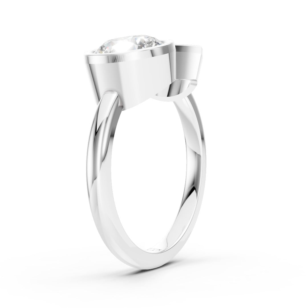 Toi at Moi Bezel Set Pear and Round Cut Diamond Anniversary Ring