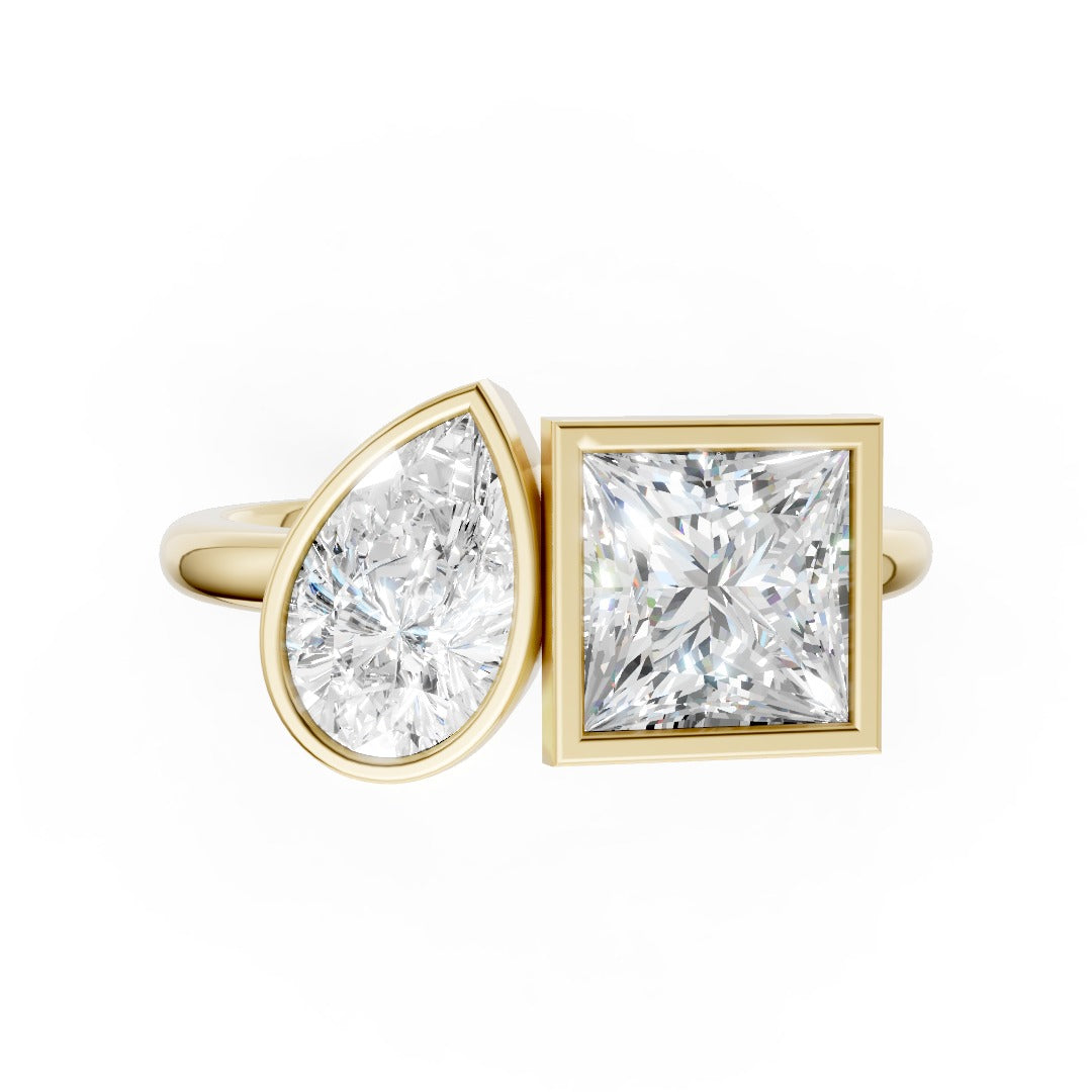 Toi at Moi Bezel Set Pear and Princess Cut Diamond Anniversary Ring