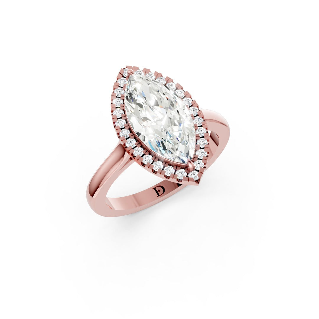 Marquise Brilliant Cut Halo Diamond Cathedral Shank Ring