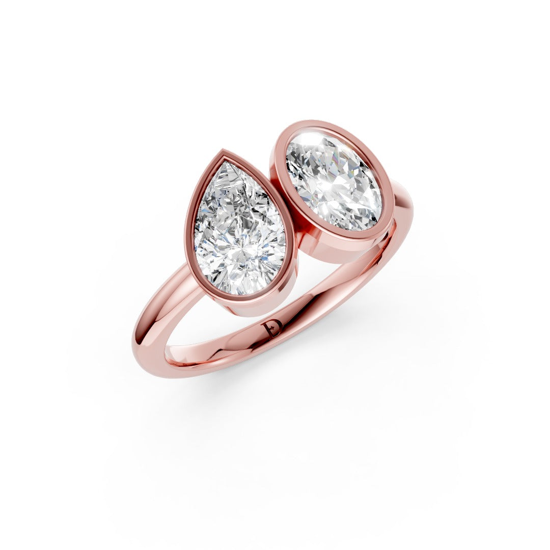 Toi at Moi Bezel Set Pear and Oval Cut Diamond Anniversary Ring