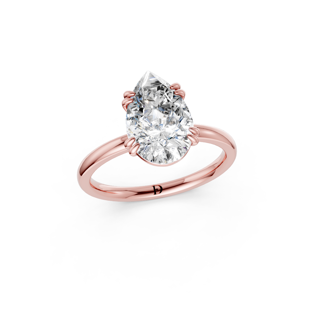 Double Prong Pear Solitaire Ring