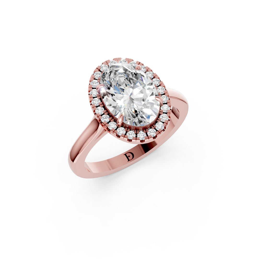 Oval Brilliant Cut Halo Diamond Cathedral Shank Ring
