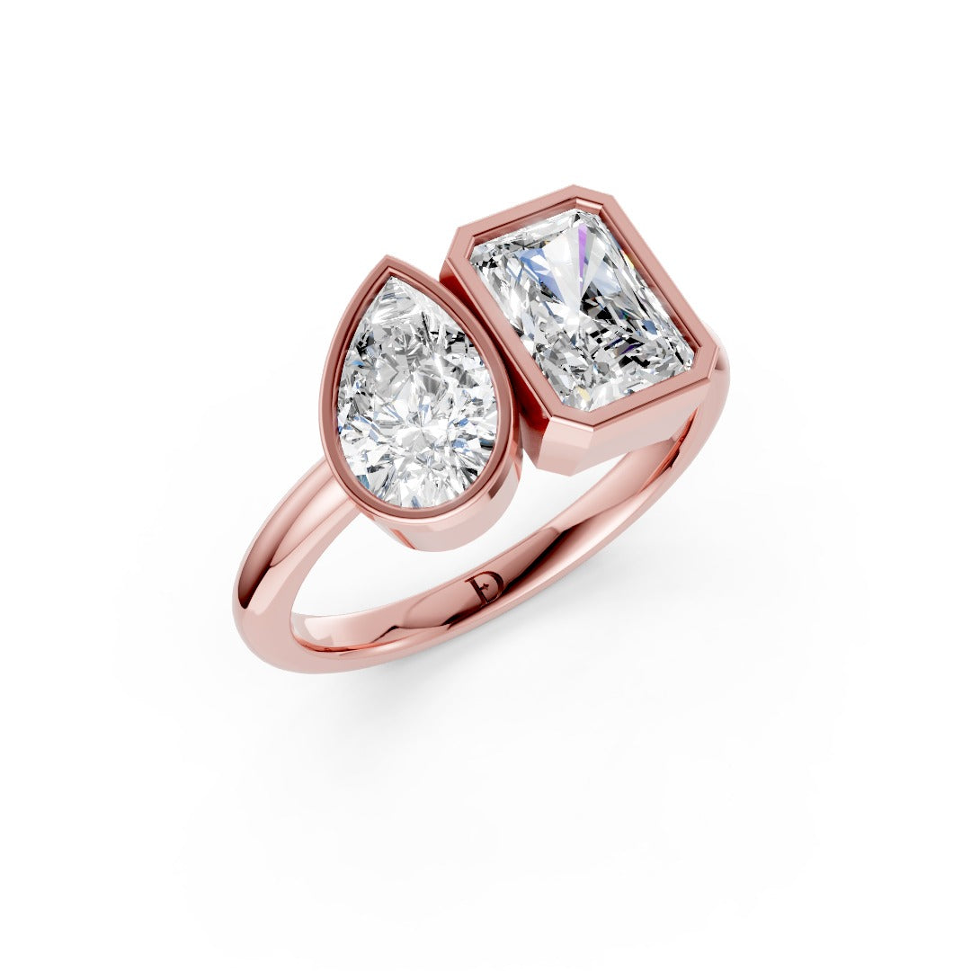 Toi at Moi Bezel Set Pear and Radiant Cut Diamond Anniversary Ring