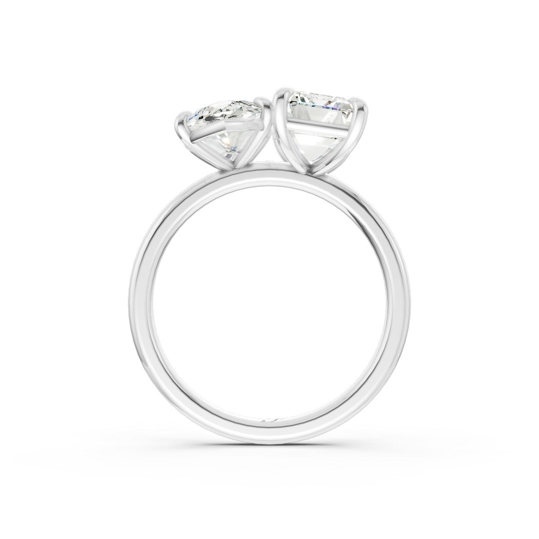 Emerald And Marquise Cut Diamond Two-Stone Ring