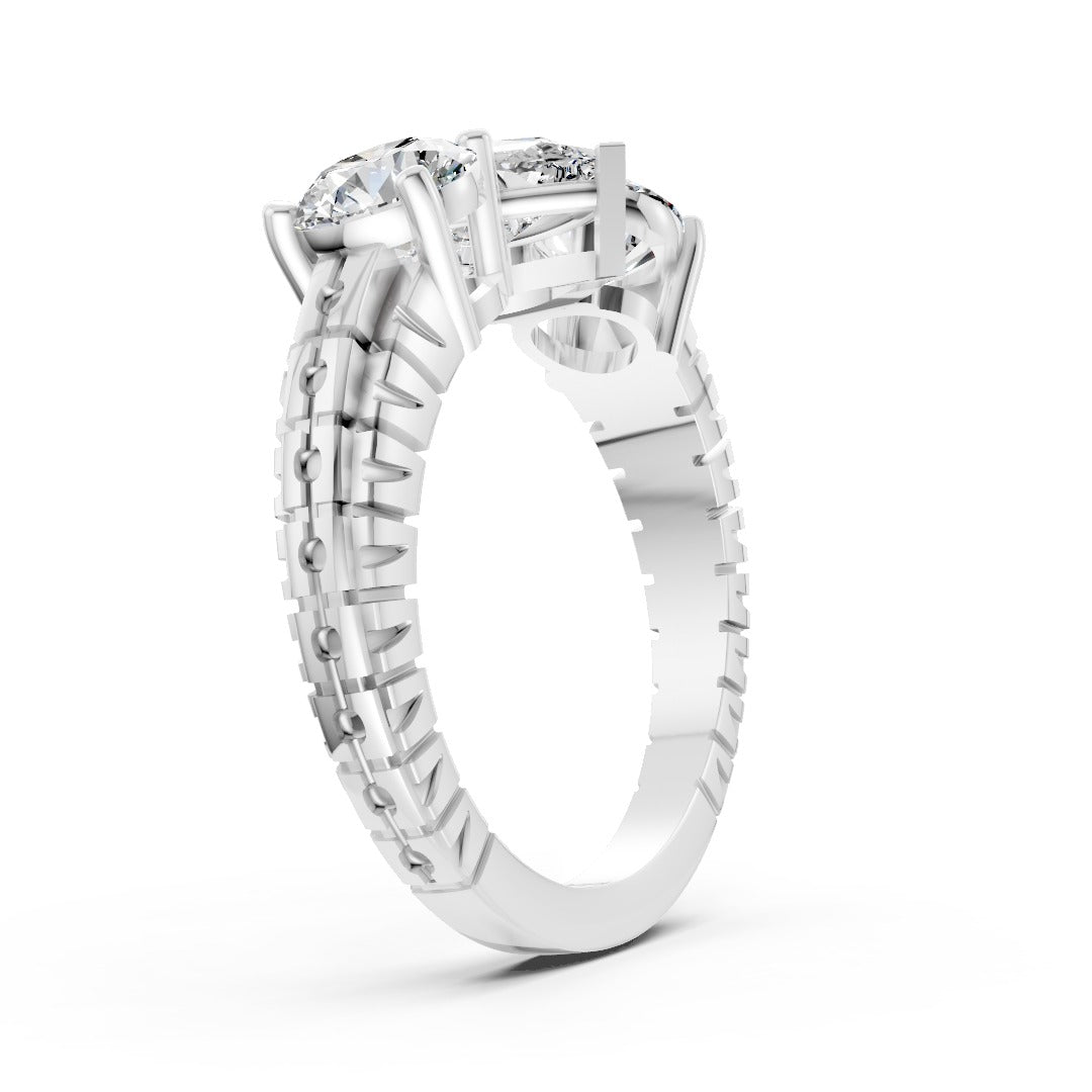 Pear Cut Three-Stone With Ribbed Textured Band Ring