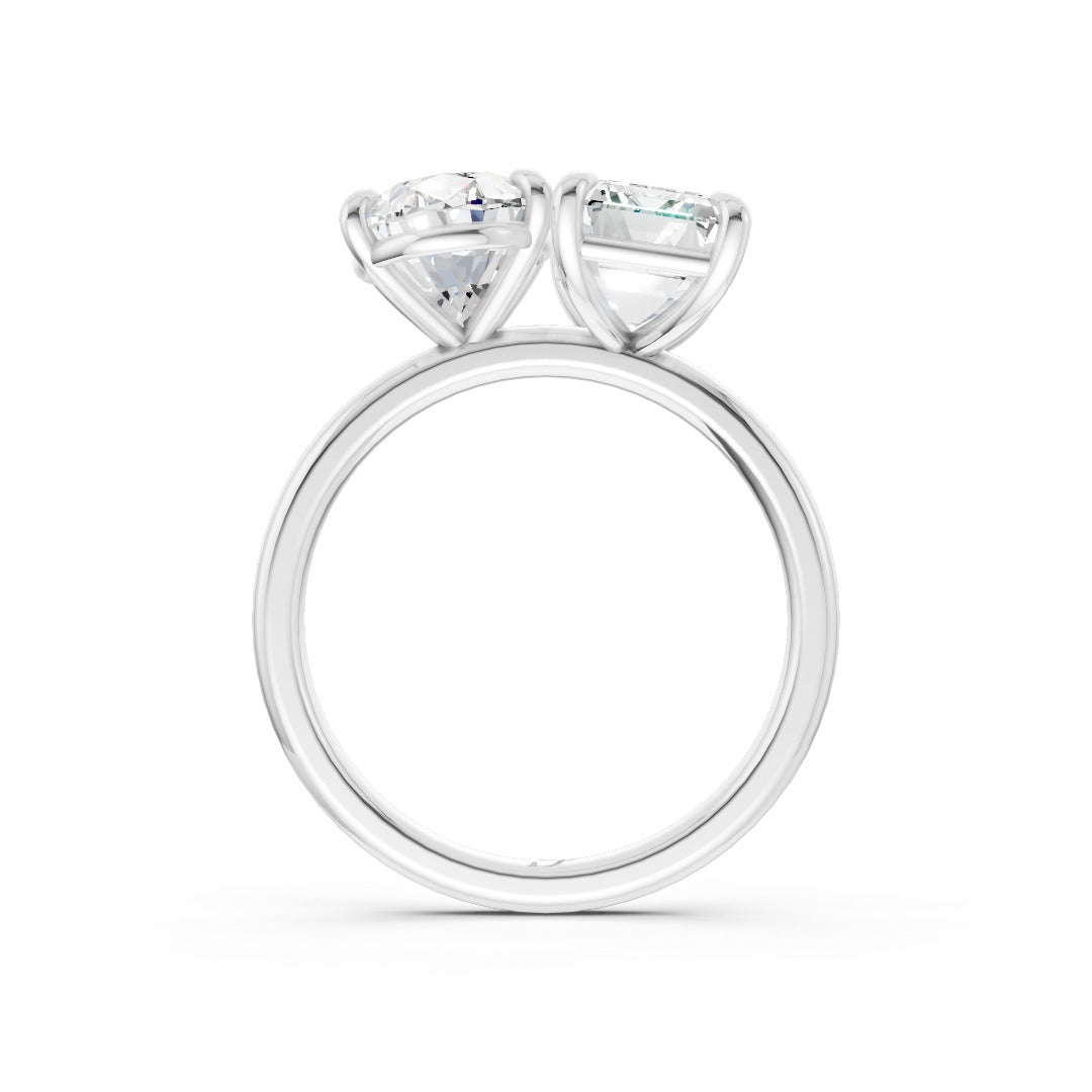 Emerald And Oval Cut Diamond Two-Stone Ring