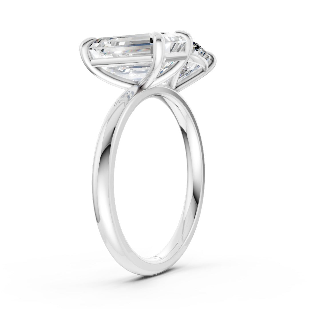 Emerald And Round Cut Diamond Two-Stone Ring