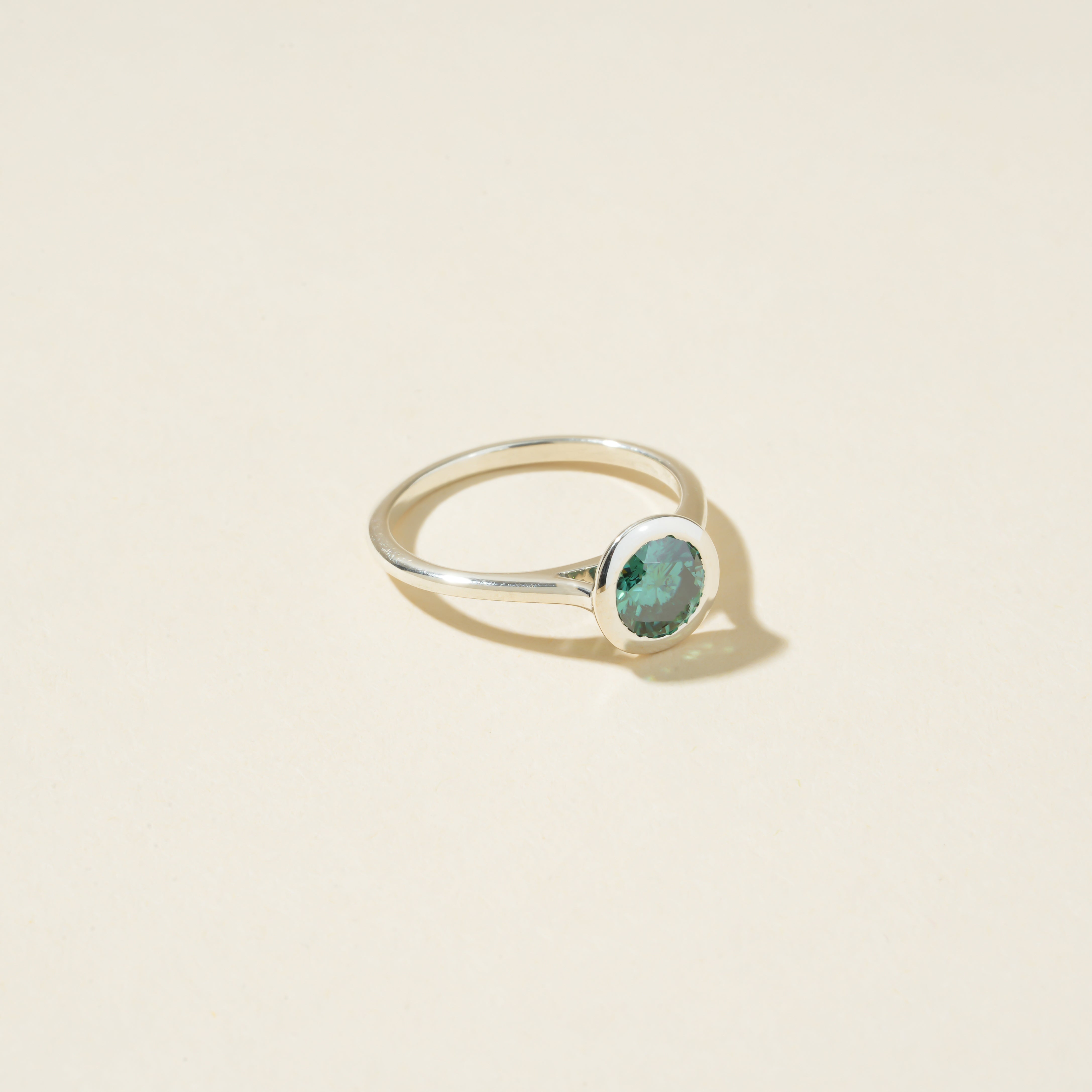 Green Round Cut Bezel Set Ring