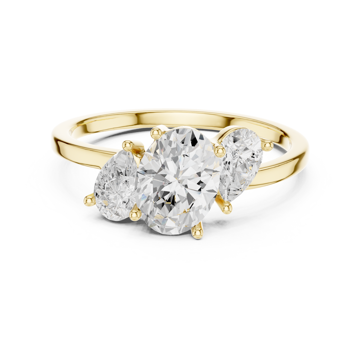 Three Stone Oval and Pear Cut Diamond Ring