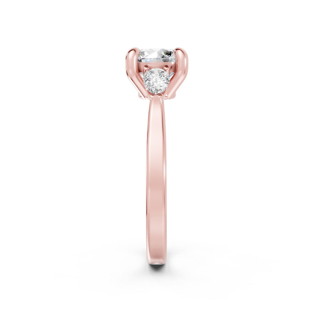 Round Cut Lab Diamond Claw Trilogy with Pear Side Stones ring