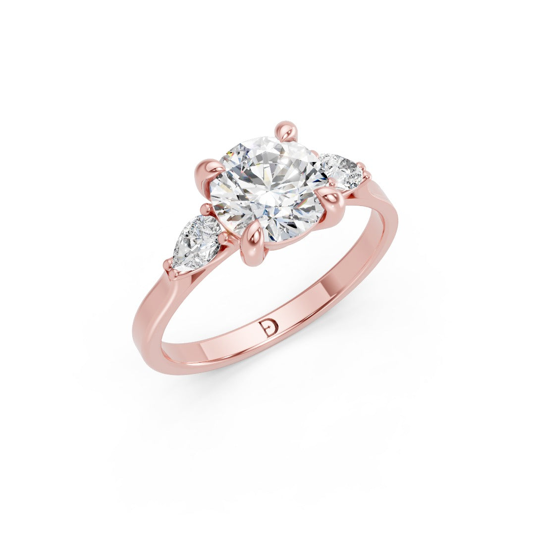 Round Cut Lab Diamond Claw Trilogy with Pear Side Stones ring