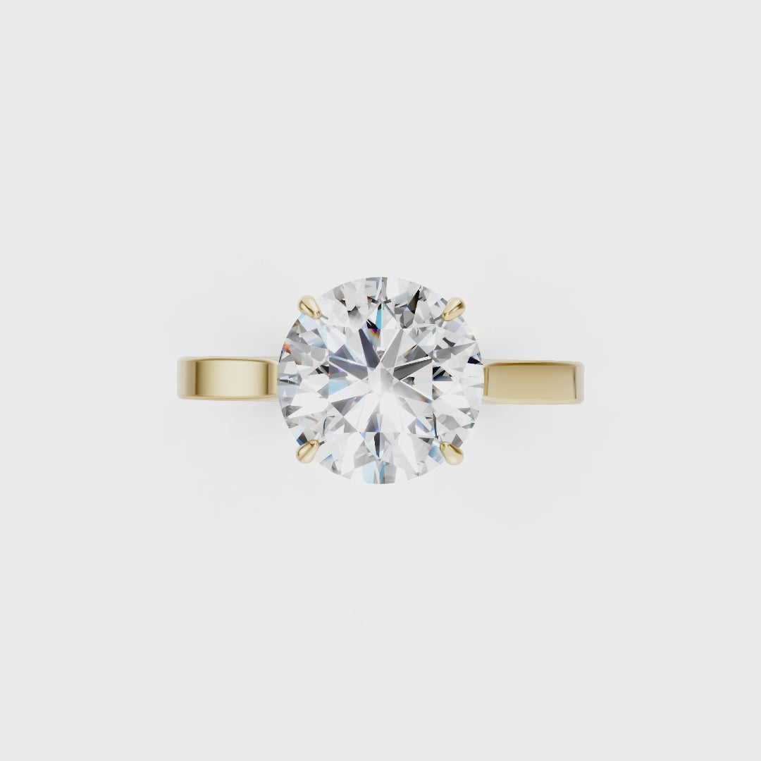 Round Solitaire Cathedral Shank Ring