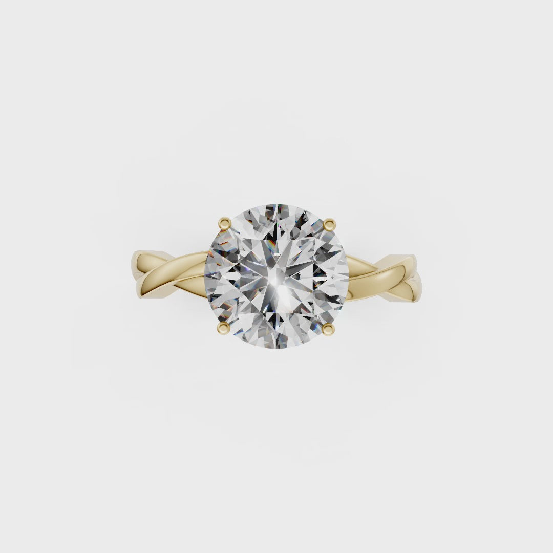 Round Cut Diamond Crisscross Ring